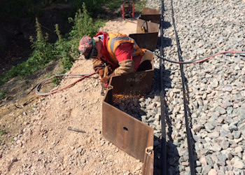 Oxy-acetylene holes cut for rebar then shuttering